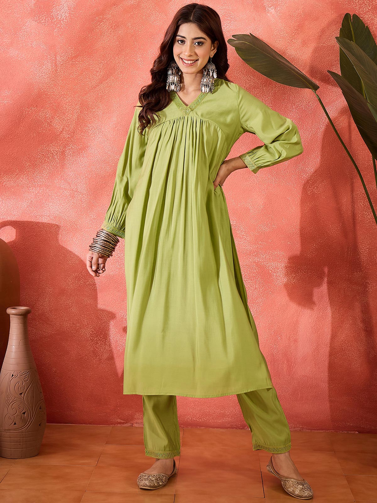 Women Solid Kurta with Trousers