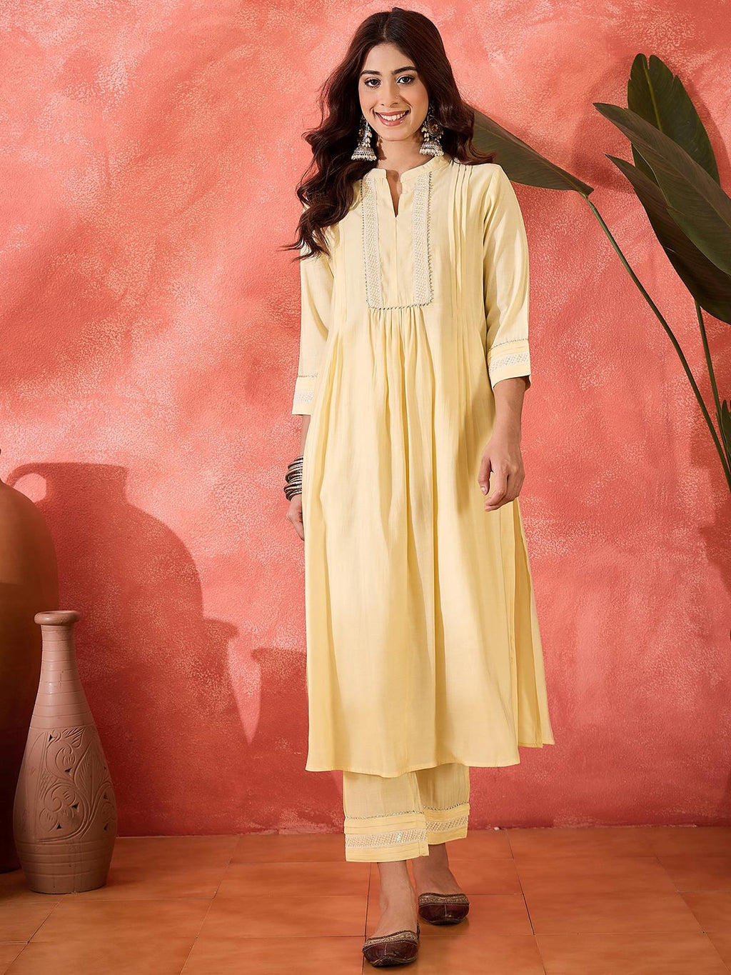 Women Cream Solid Kurta with Trousers