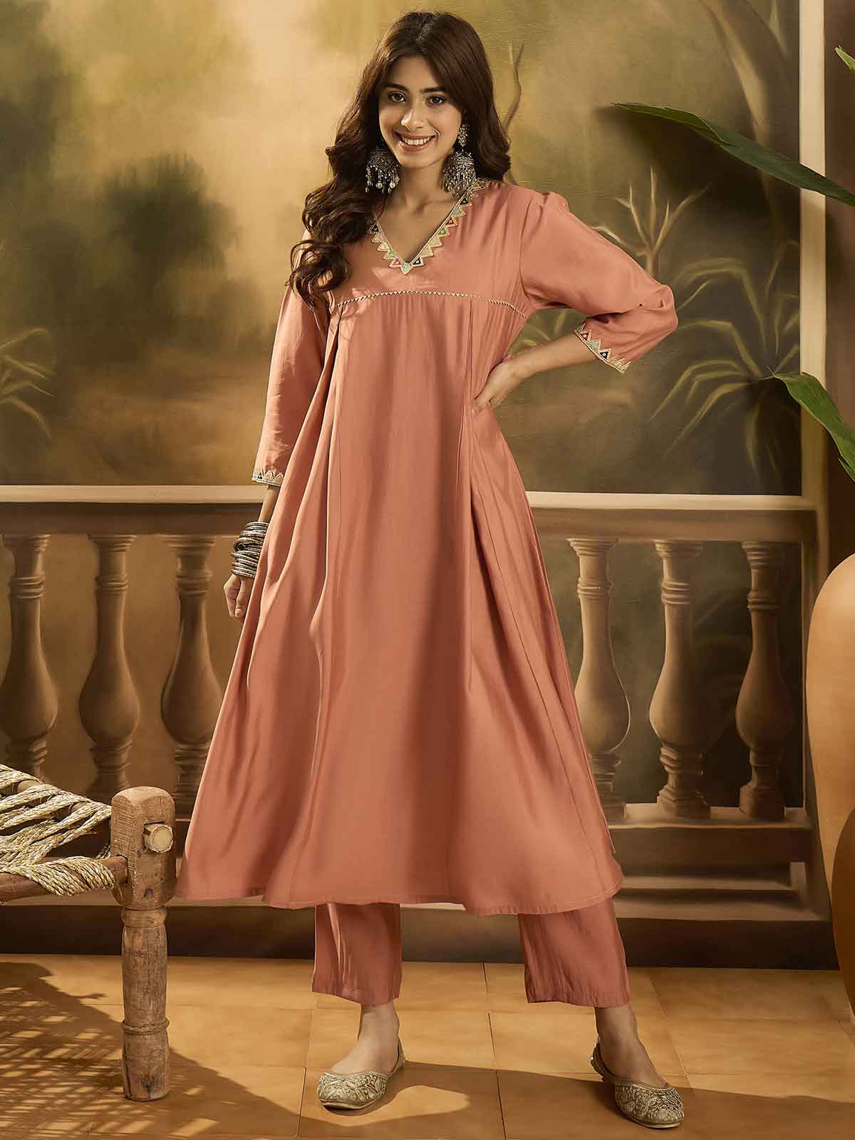 Women Solid Embroidered Kurta with Trousers