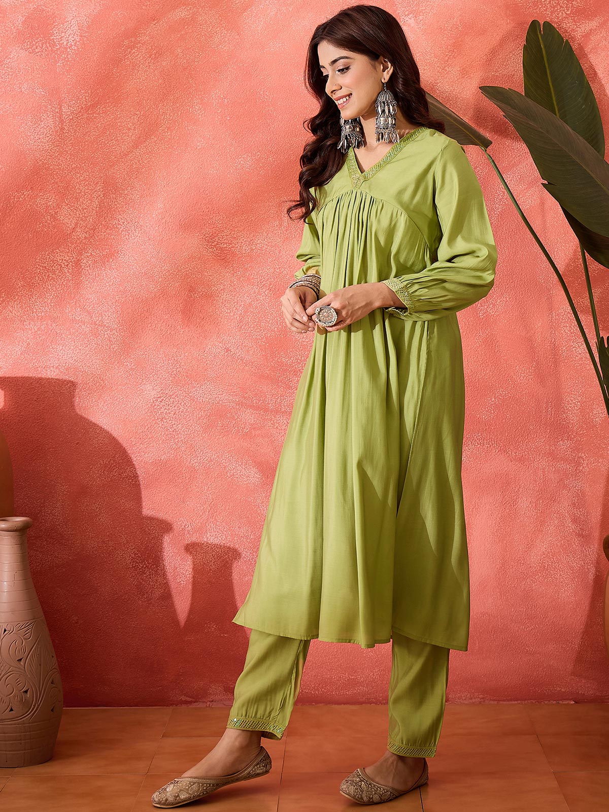 Women Solid Kurta with Trousers
