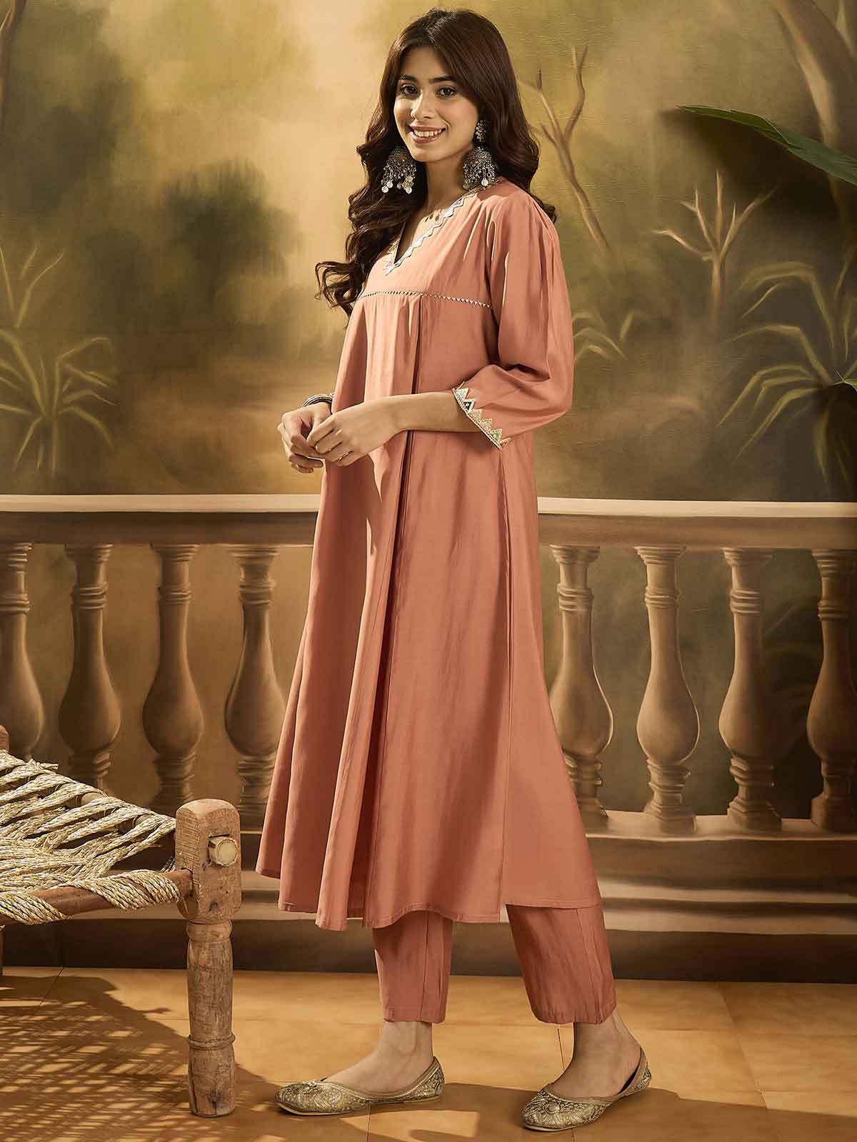 Women Solid Embroidered Kurta with Trousers