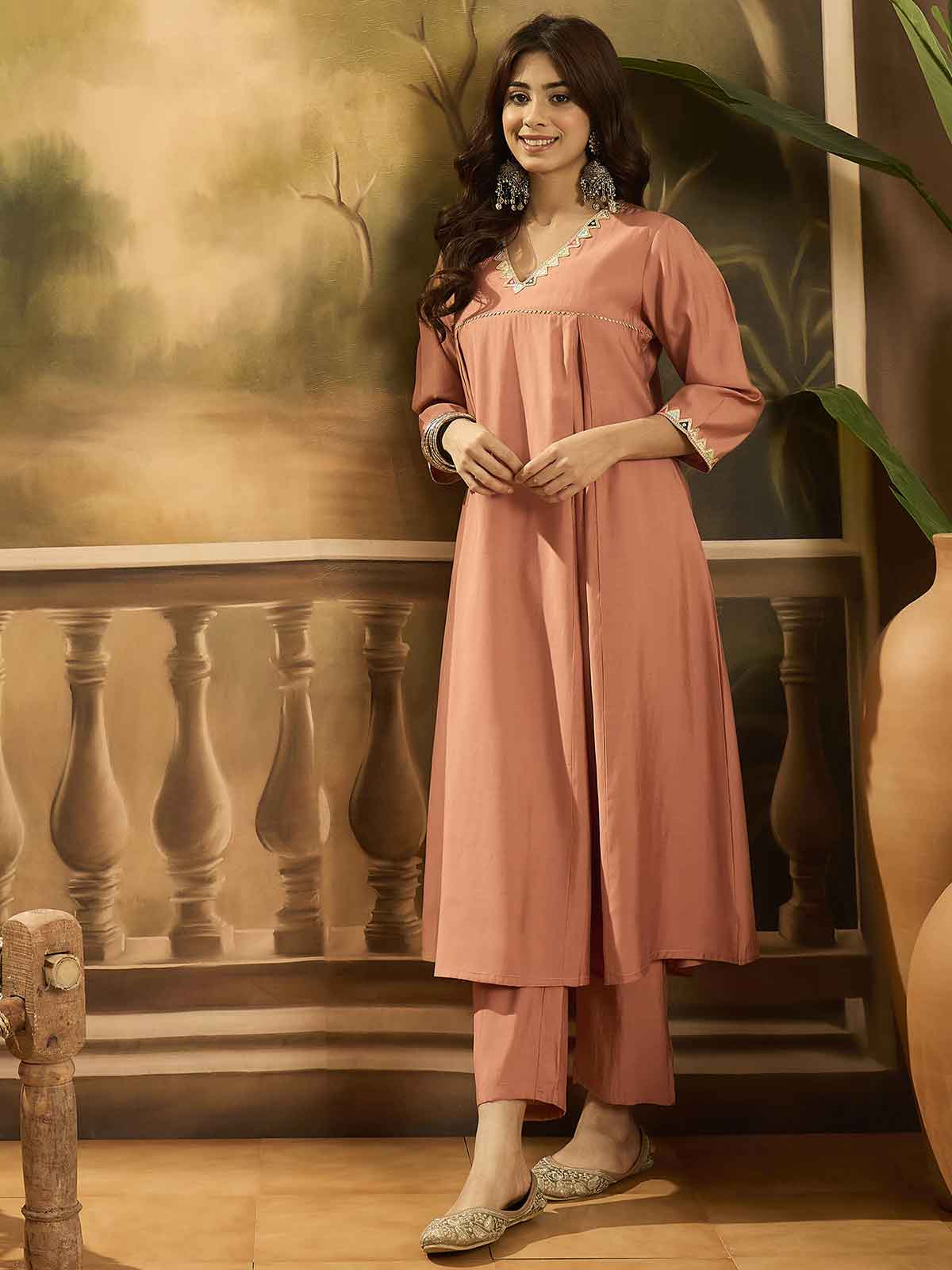 Women Solid Embroidered Kurta with Trousers