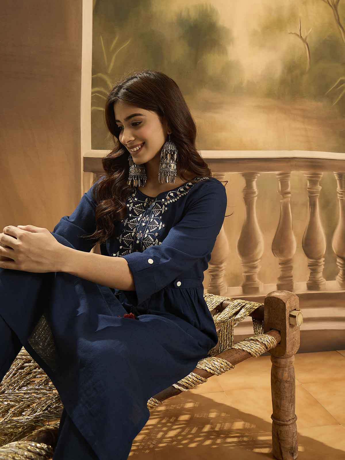 Women Ethnic Motifs Embroidered Kurta with Trousers