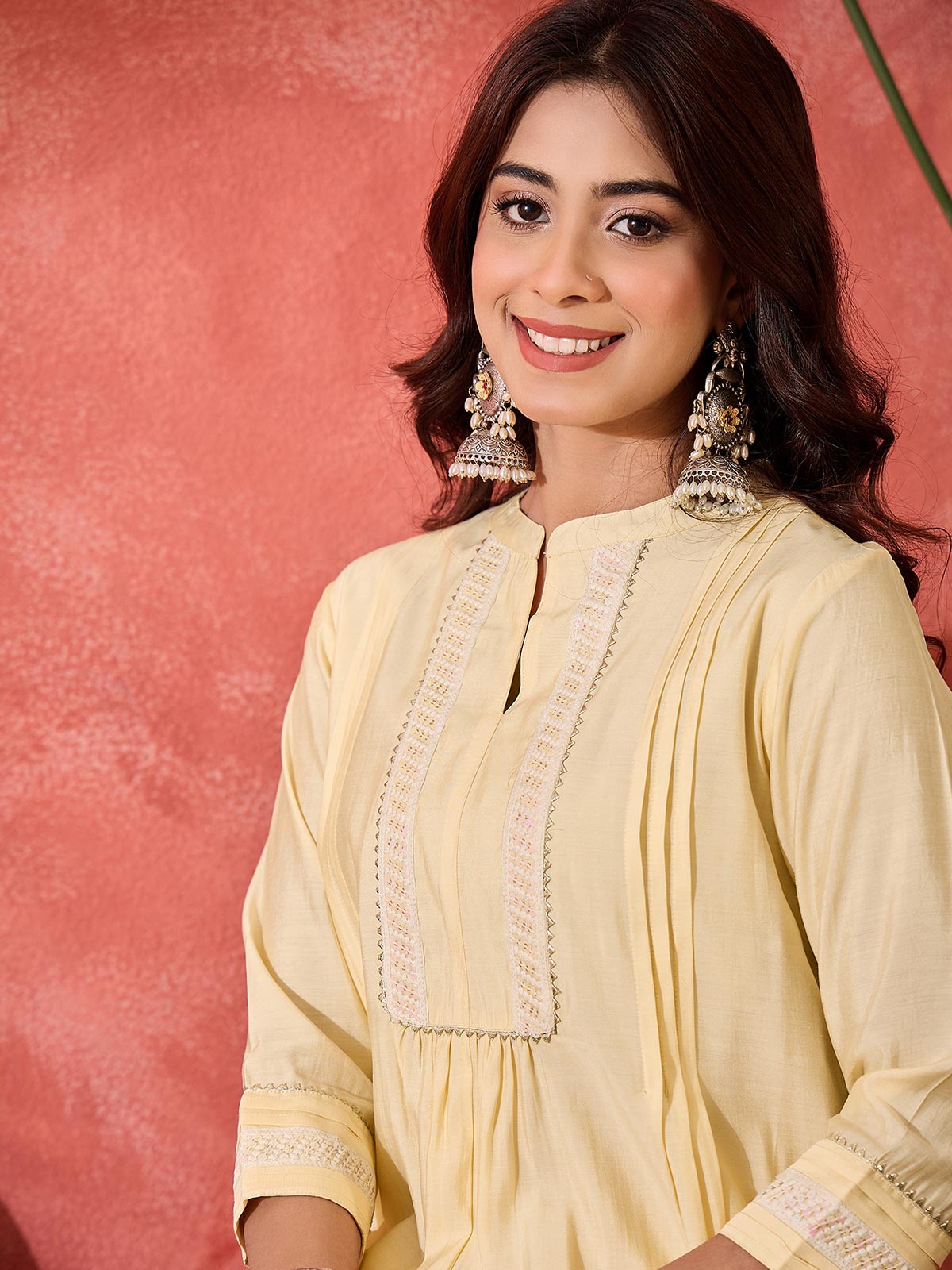 Women Cream Solid Kurta with Trousers