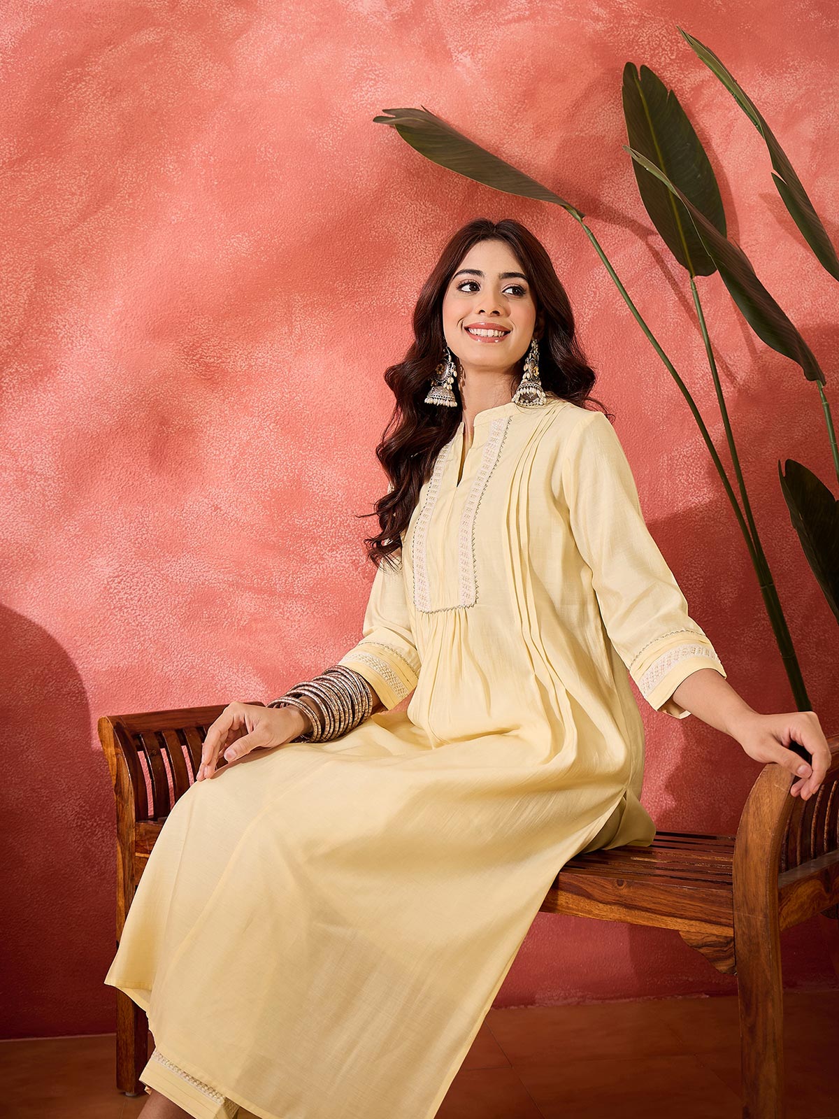 Women Cream Solid Kurta with Trousers