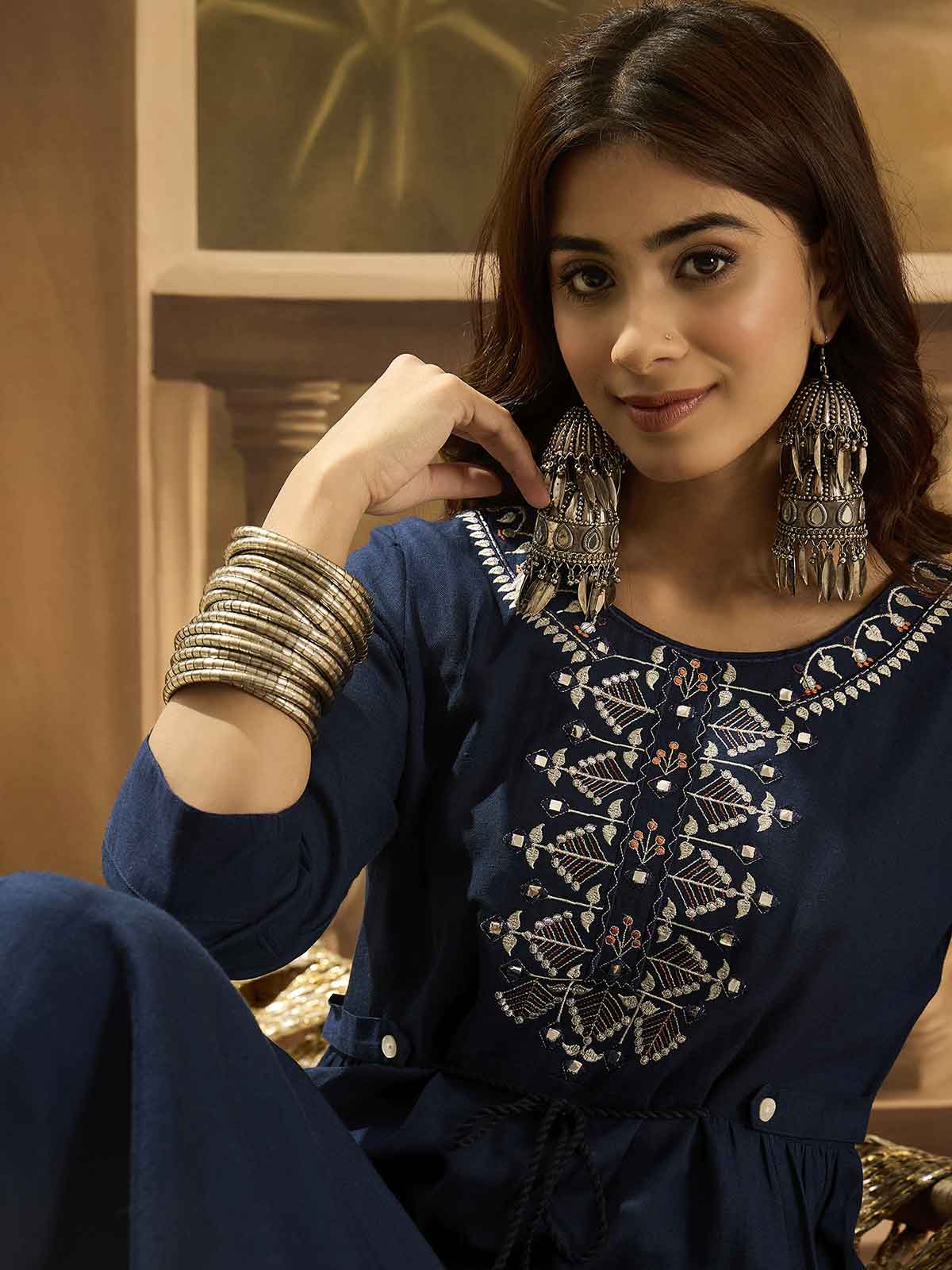 Women Ethnic Motifs Embroidered Kurta with Trousers