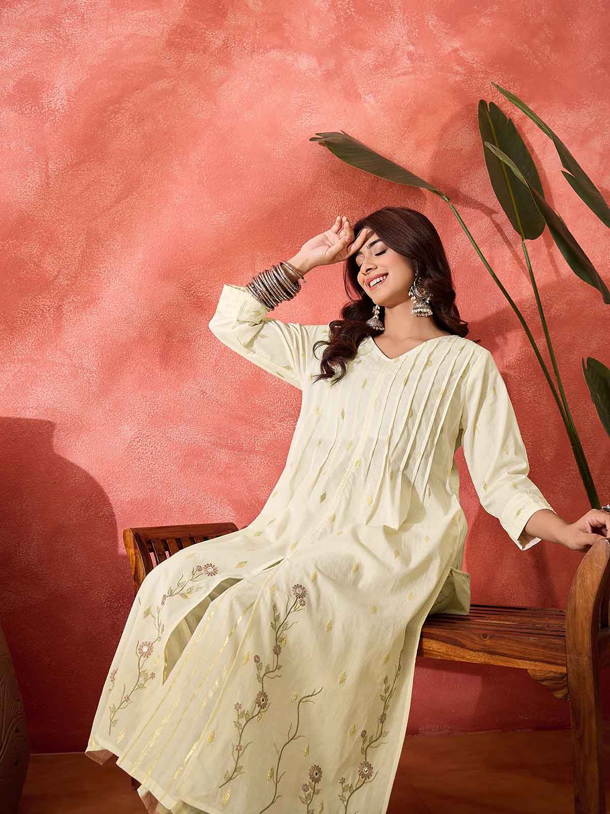 Women Floral Embroidered Cotton Kurta with Trousers