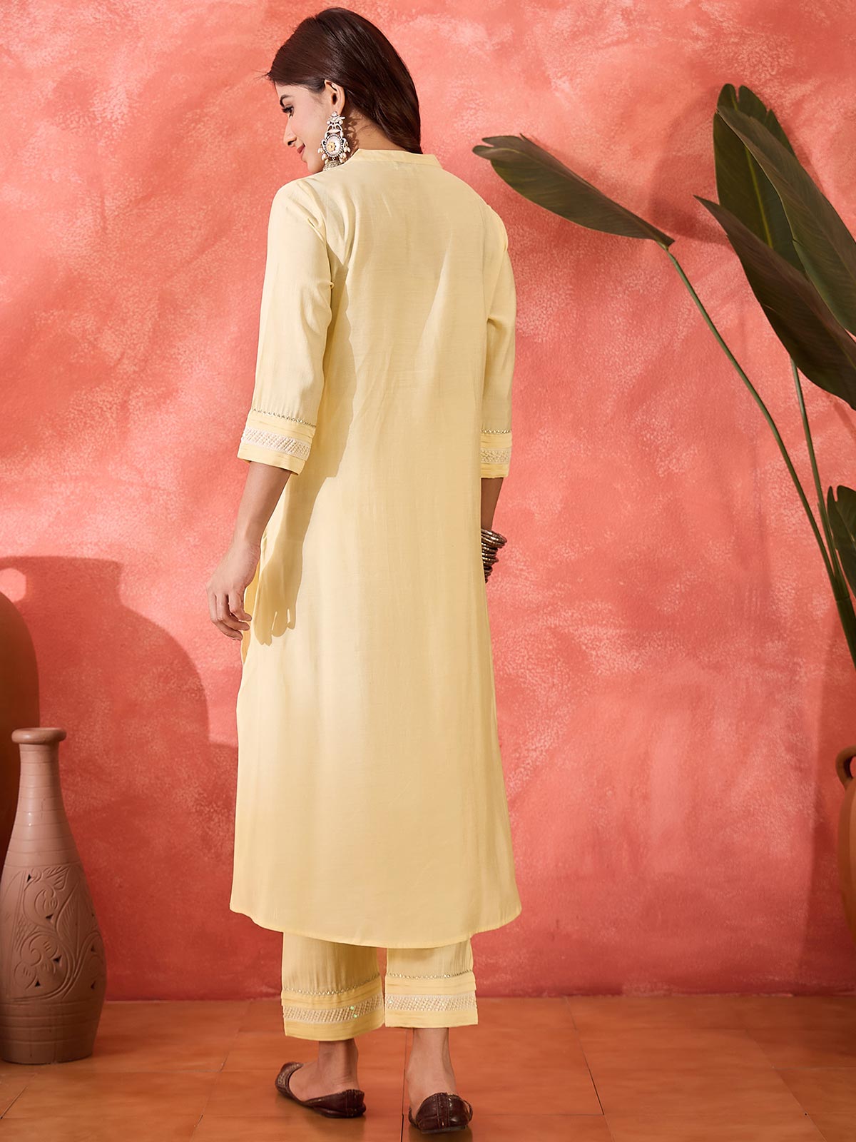 Women Cream Solid Kurta with Trousers