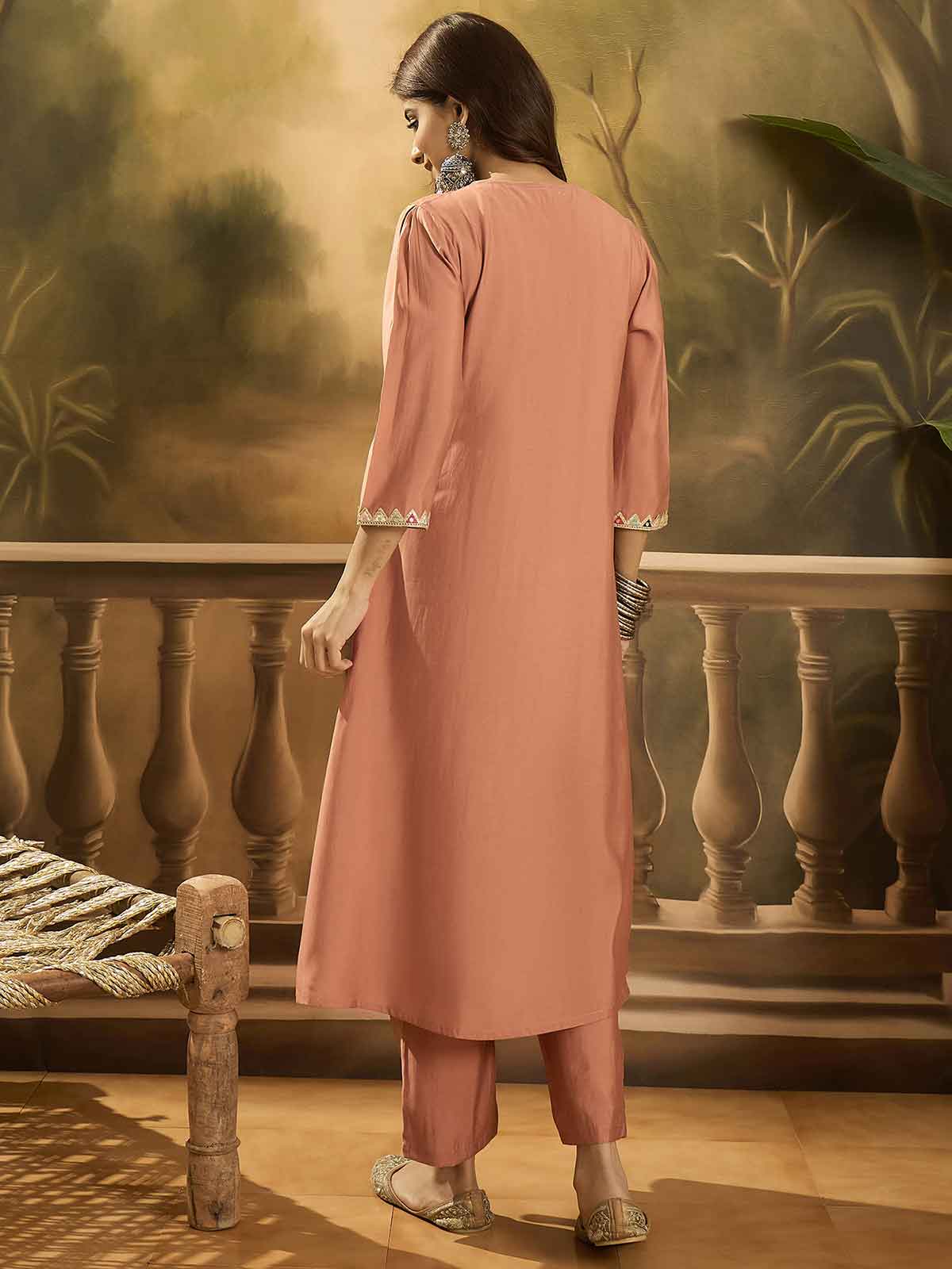 Women Solid Embroidered Kurta with Trousers