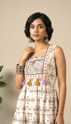 Ivory Paisley Sleeveless Tiered Midi Dress with Tassels | Daylist.in